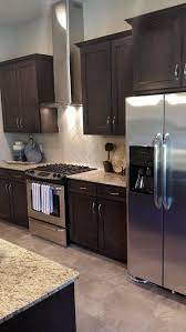 Pin By Veronica Moon On Kitchen Ideas Brown Kitchen Cabinets Dark Brown Kitchen Cabinets Backsplash With Dark Cabinets