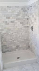 Modern farmhouse bathroom with rustic stool and wicker baskets. 30 Stunning Farmhouse Shower Tile Ideas