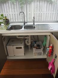 I love the idea of using your under stair space to create extra space for shelving and storage in your home. How To Organise Under A Kitchen Sink Cupboard With Limited Space The Plumbette
