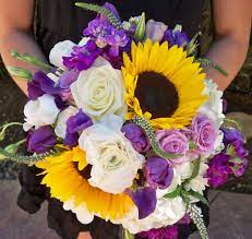Artificial wedding bouquets in buttery yellow tones. This Is My Wedding Bouquet It Couldn T Have Been More Perfect Thank You Nina Fro Wedding Flowers Sunflowers Yellow Wedding Bouquet Sunflower Wedding Bouquet