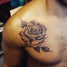 A rose tattoo on your chest allows you to hold your loved ones and the symbol of love close to your heart for the perfect balance of love and care. Rose Tattoo On Man Chest Side Parryz Com