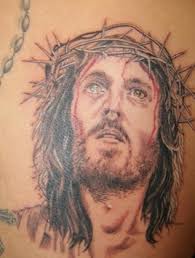 The Busy Catholic: Religious tattoos a sign of holiness?