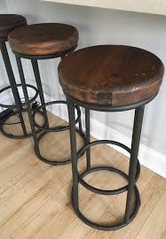 Simplicity is key, and modern bar stools often have clean lines and little to no embellishment. Three Kosas Brand Wood And Welded Iron Bar Stools Bar Height Bar Stools For Sale In Germantown Md Offerup Rustic Bar Stools Iron Bar Stools Stool