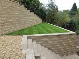 (300 mm) behind the block. How To Build A Block Retaining Wall Which Will Complement Your Garden