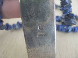 ﻿1 5/8 long x 1/ wide design: R And Crescent Moon Native American Jewelry Tips
