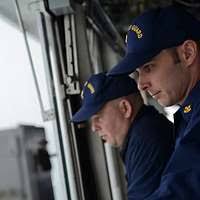 CO of USS George Washington speaks with Master Chief Petty Officer of the  Navy Rick D. West.