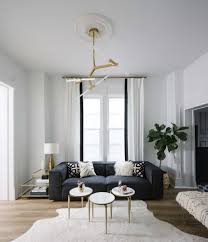 These simple small living rooms prove you do not need a lot of square footage to create a stylish and functional space. The Gray Sofa From Interior Define Is A Clear Choice For Minimal Modern Interiors Its Low S Living Room Interior Rugs In Living Room Living Room Scandinavian