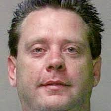 Cleveland County DA sued by former assistant over mug shot fracas