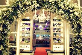White Peacock Flowers Wedding Arch With Crystal Chandelier At Pastis Aston Kuningan