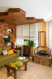 This green living room features stunning pink velvet accent chairs, beautifully offset against the chalky green colour on the walls. Naturalistic Yellow And Green Living Room With Summer Mood Home Interior Design Kitchen And Bathroom Designs Architecture And Decorating Ideas