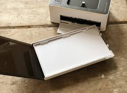 Combination ink cartridge prints high quality full color photographs; Kodak Photo Printer Dock Review Watch Us Print In Minutes Gearbrain