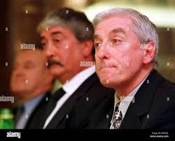 Holding back the tears Roy Evans announces his resignation as joint-manager  of Liverpool watched by Liverpool chairman David Moores (centre) during an  emotional press conference at Anfield Stock Photo