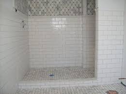 Here, the black grout goes perfectly with the black painted sloped ceilings. Showers With Subway Tiles And Marble Tiles Google Search White Subway Tile Shower Subway Tile Showers White Subway Tile Bathroom