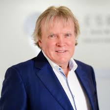 Who is Dr Patrick Treacy?