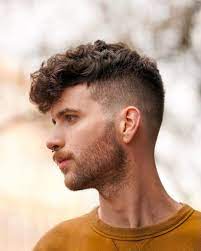 The high vanish accents the curls on the top, so ensure you select a styling cream or even oil that is implied for texturizing and also defining hair while keeping it in position. 19 Fade Haircuts For Cool Curly Hair 2021 Trends
