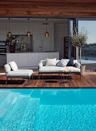 A modern steel fire pit is available in a variety of sculptural silhouettes. Enjoy The Summer With The Anholt And Lido Collections By Skargaarden