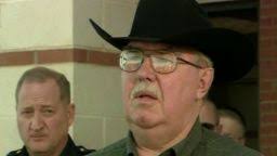 Wife of former official arrested in murder of Texas DA