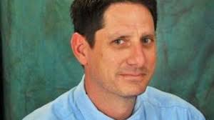 Florida paper names business editor