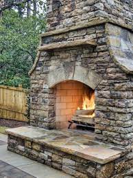 Prepare the base by digging a hole between 6 and 12 inches deep. How To Build An Outdoor Stacked Stone Fireplace Hgtv