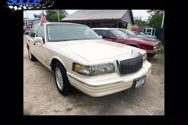 Image result for Light Prairie Tan 1997 Town Car