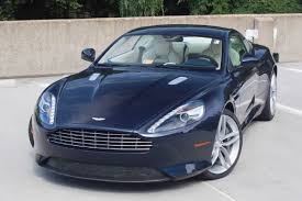 Image result for Concours Blue 2024 Aston Martin