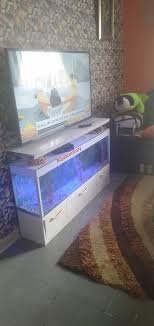 Find the perfect home furnishings at hayneedle, where you can buy online while you explore our room designs and curated looks for tips, ideas & inspiration to help you along the way. Tv Cabinet Design With Aquarium Novocom Top