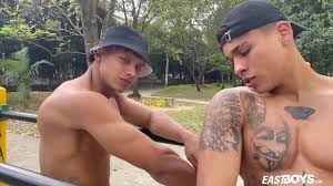 Who wants to see two muscular dudes working out in the park, flexing and  comparing muscles? I hope you do! Fun continues in the residence, where  these muscular dudes will oil up