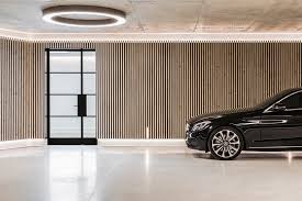 Deluxe garage doors specializes in steel doors or full glass in a wide variety of designs. Deluxe Private Multi Car Garage In Sydney Covet