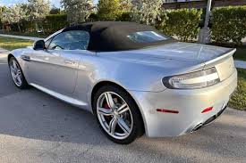 Image result for Lightning Silver 2010 Aston Martin