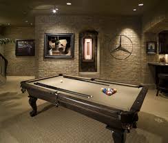 10 Must Have Items For The Ultimate Man Cave Man Cave Room Man Cave Home Bar Modern Man Cave