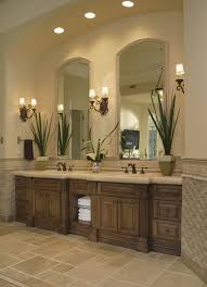 Continue to 16 of 17 below. Rise And Shine Bathroom Vanity Lighting Tips Bathroom Remodel Master Brown Bathroom Traditional Bathroom
