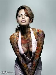 With its distinct golden petals, the sunflower has been known to signify joy, love, luck, and good health. The Womans Skin Was A Map Of The Town Full Body Tattoo Body Tattoos Girl Tattoos