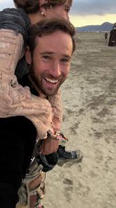 Best way to get around at #burningman is to give your girlfriend a  piggy-back ride