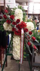 Orange & white single ended spray. Funeral Flower Arrangements Near Me