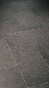 The good news is, various waterproof flooring materials can be used. Basement Bathroom Cement Shower Floor With Grey Tile In Rest Of Room Bathroom Floor Tiles Tile Bathroom Bathroom Flooring