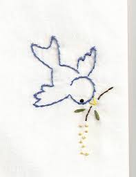 Embroidery pattern of a bird, sitting on a branch surrounded by a frame of leafy vines and scallops. But With More Designs An Eagle S Aerie An Eagle With A Branch Eagles Airdancing And Birds Embroidery Designs Simple Embroidery Embroidery Patterns Vintage