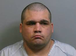 Man charged in spray-painting of bizarre word