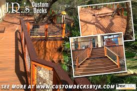 Madeira trex bench with deck lighting on a winchester grey trex deck and deckorator rails built in alaska by contractor, treeline construction, the leading local deck and dock builder for anchorage, eagle river, wasilla, palmer, girdwood, big lake, and the. Custom Decks J R S Custom Decks