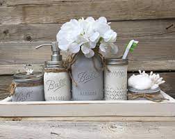 Made with a durable stainless steel lid that is coated black, and a durable black stainless steel dispenser coupled with a collar ring, this bath and kitchen accessory is designed to last. Rustic Bathroom Accessories Etsy