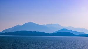 File_download mountain and forest are reflected in the water of the lake, italy. Stresa Verbano Cusio Ossola Italy 4k Wallpaper