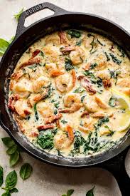 Reduce the heat to medium and simmer for 7 to 10 minutes until the mixture thickens. Easy Creamy Tuscan Shrimp Recipe Salt Lavender