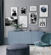 Blaue Einrichtung Mit Bilderwand In Schwarz Weiss Wohnzimmerwand Wohnzimmer Design Wohnzimmer Ideen Wohnung