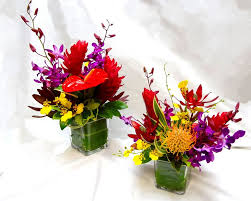 Pin By F L On I Said Yes Tropical Flower Arrangements Tropical Floral Arrangements Hawaiian Flower Arrangements