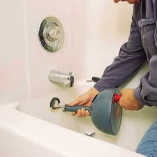 To use a plumbing snake through the clean out. How To Snake Out Clogged Bathtub Super Brothers Plumbing Heating Air