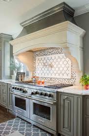 You can choose favorite lyrics, a poem, or something uniquely meaningful to your family to use as your stencil. Gray French Kitchen With Gray Herringbone Cooktop Backsplash Tiles Transitional Kitchen