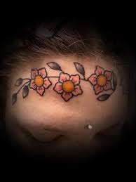 Image result for quirky pylon forehead tattoo
