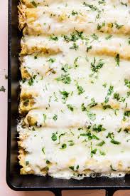 Green Chicken Enchiladas The Modern Proper Recipe In 2020 Green Chicken Enchiladas Chicken Casserole Dinners Easy Enchilada Recipe