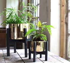 Black And Gold Design For Pots Are You Interested In Our Gold Plant Pot On A Stand With Our Wedding Gift You Need Look No Further Gold Planter Interior Design Plants Indoor Planters