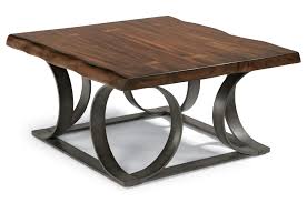 Handcrafted in solid mango wood this coffee table is a unique piece of furniture that brings a rustic charm to any living area. Flexsteel Farrier 6729 032 Rustic Log Cut Square Cocktail Table With Dark Metal Base Thornton Furniture Cocktail Coffee Tables