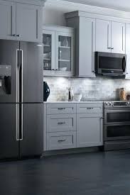 I Like That Stove And I M Thinking I Should Do The One Without The Back Kitchen Backsplash Trends Kitchen Cabinets With Black Appliances Grey Kitchen Cabinets